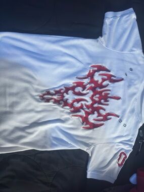 White Polo Shirt with Red Flame Graphic